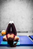 Young Woman Doing Leg Exercises at the Gym