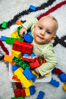 One Year Old Boy Playing