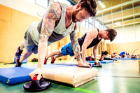 Tattooed Young Man Doing Pushups