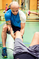 Fitness Instructor Working on Knee