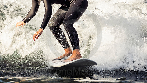 Woman River Surfing in the Alps