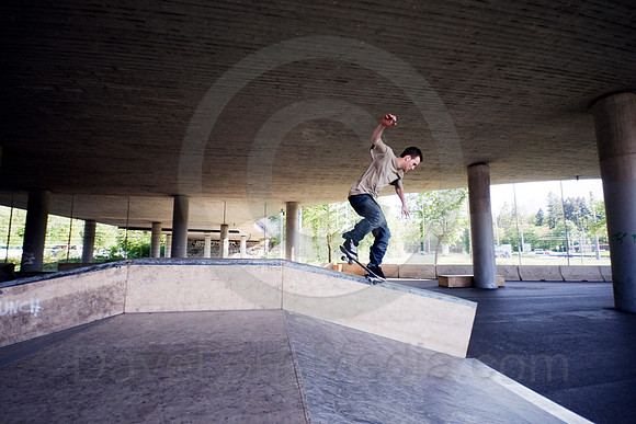 Skateboarder on Grind Box